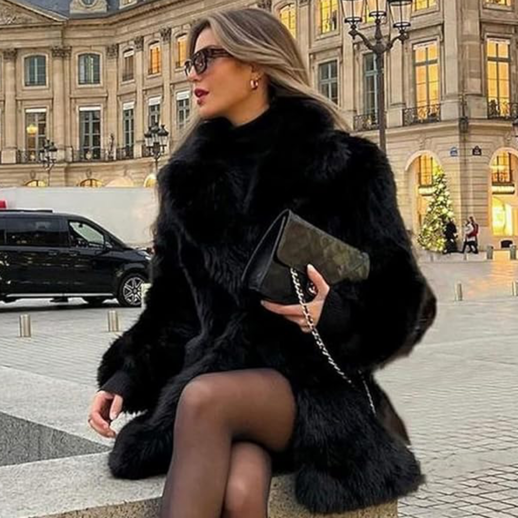 Affordable 2026 fashion trends: elegant black faux fur coat for a sophisticated statement winter look.