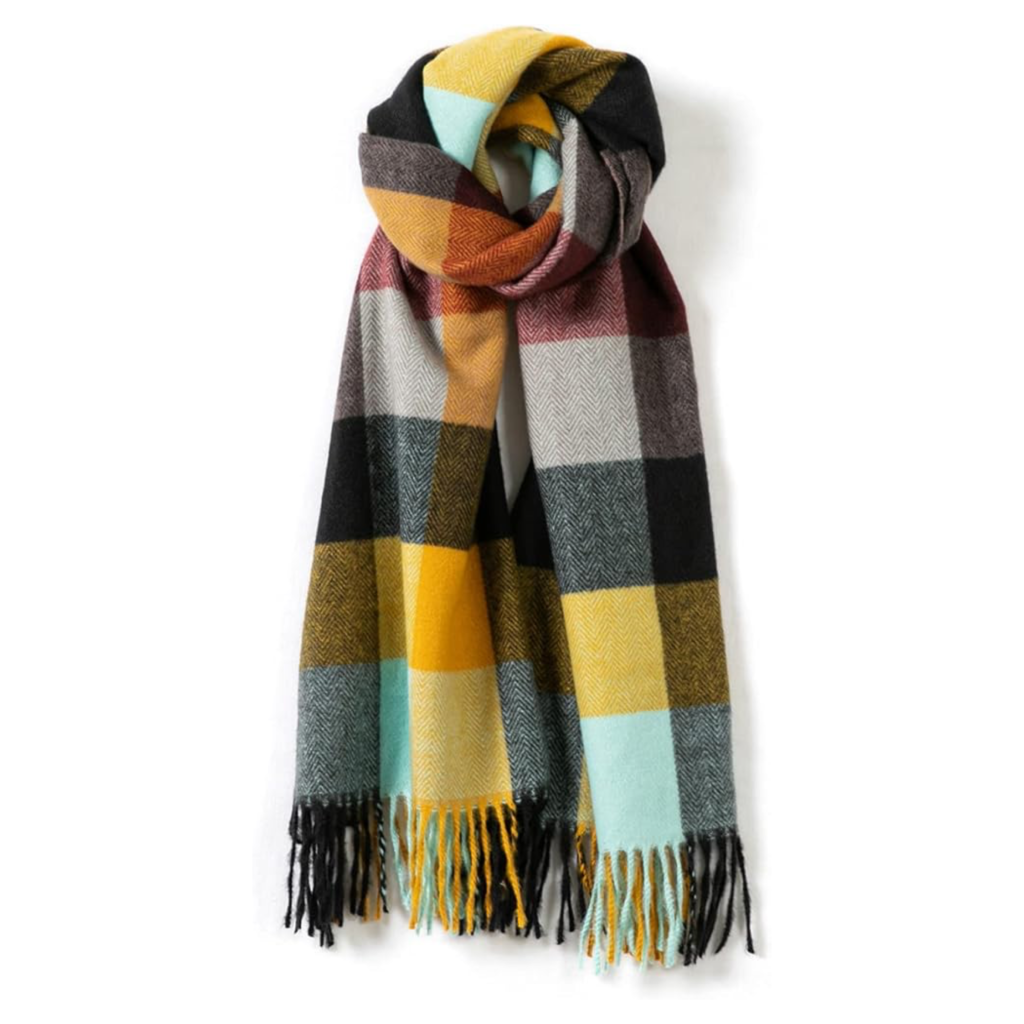 Affordable 2026 fashion trends: oversized plaid multi-color fringe scarf for a cozy winter layering look.
