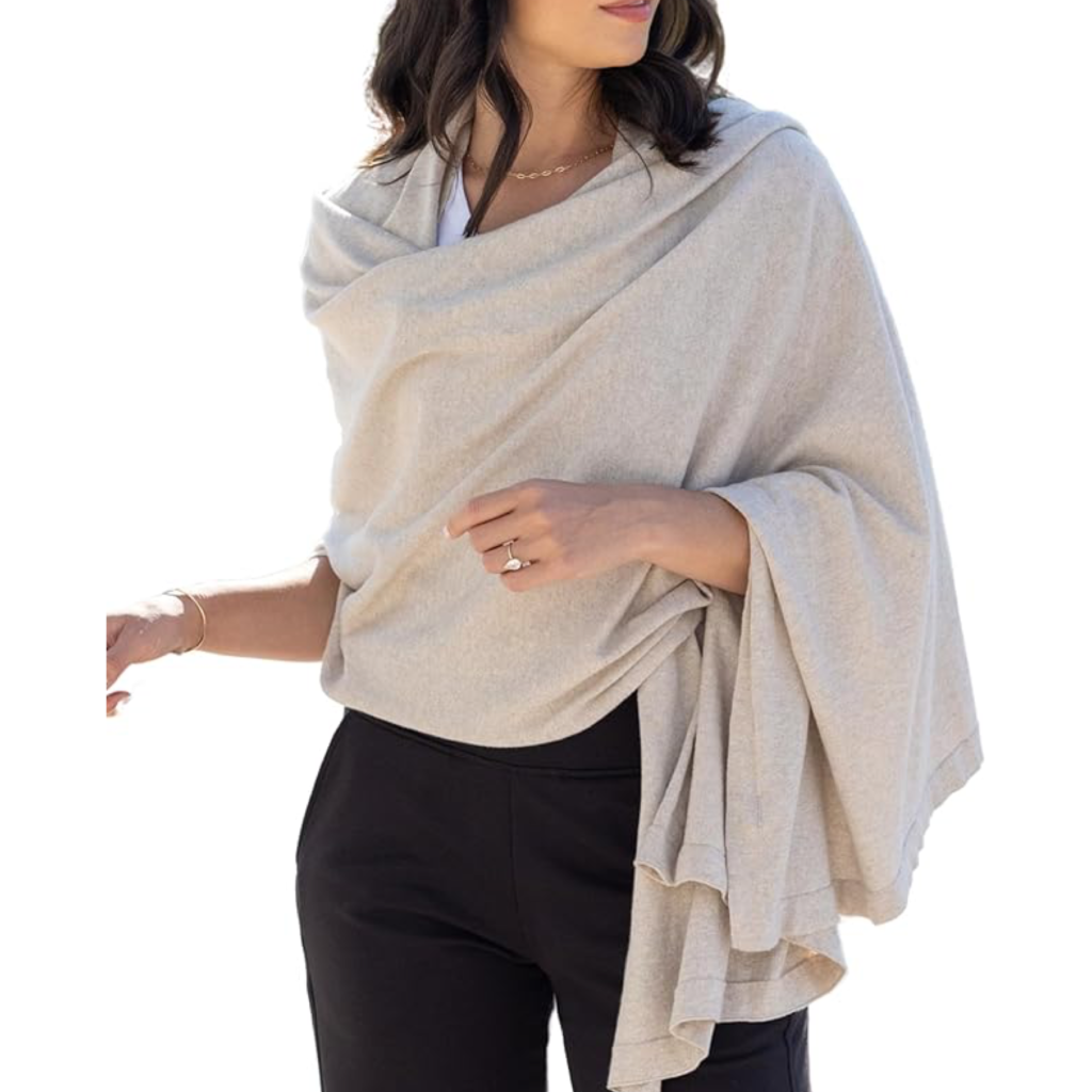Affordable 2026 fashion trends: elegant cream wrap-style scarf for sophisticated winter layering.