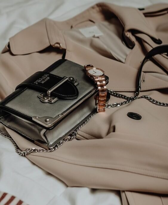 brown leather sling bag on white textile