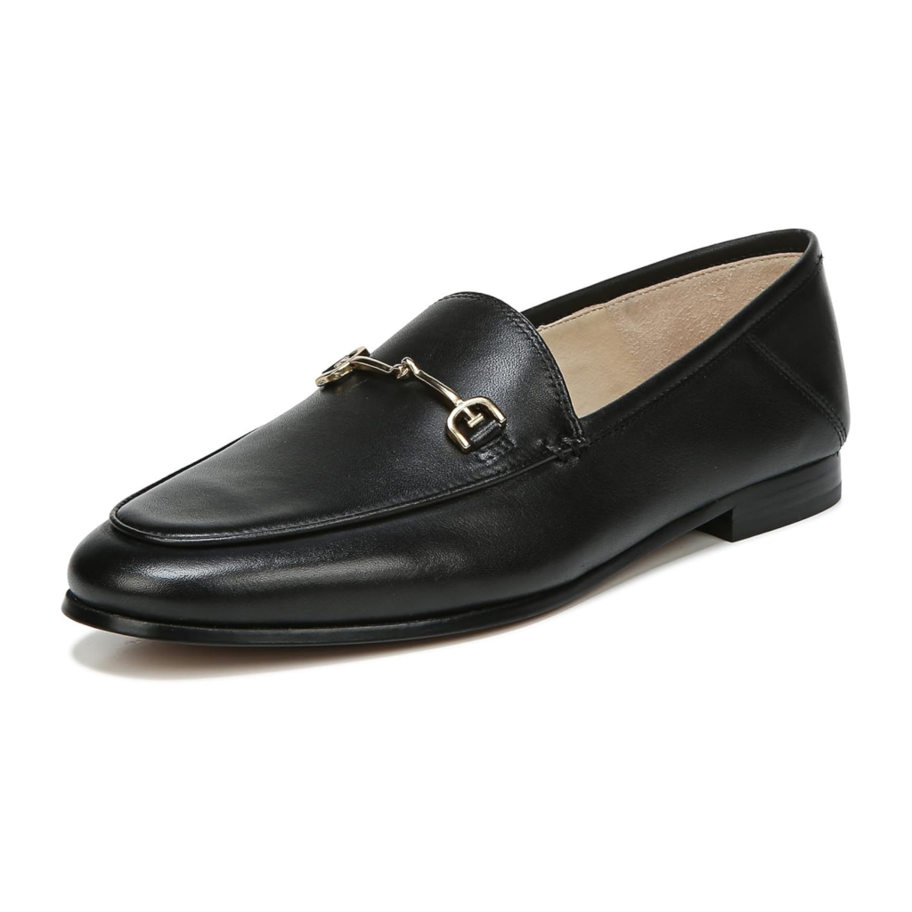 Sam Edelman Loraine Bit Loafers in black leather featuring a gold-tone horsebit detail and a slim, elegant silhouette on a white background.