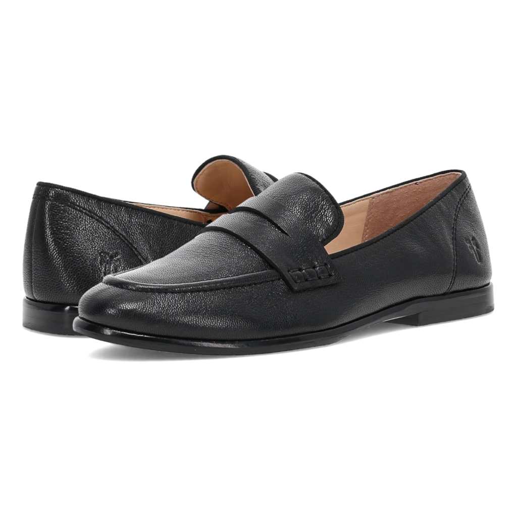 Frye Faith Loafers in polished black leather featuring a classic apron toe, low stacked heel, and a clean minimalist silhouette on a white background.