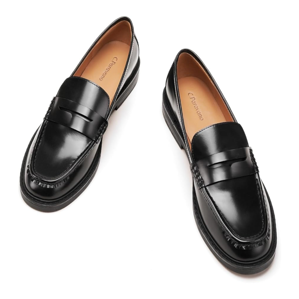 C.Paravano genuine leather penny loafers in polished black with a classic strap detail and an elegant almond toe on a white background.