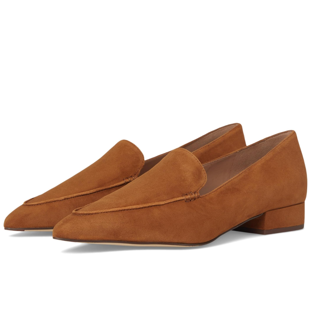 Cole Haan Valantina women's loafers in soft camel suede featuring a refined almond toe and a minimalist slip-on design on a white background.