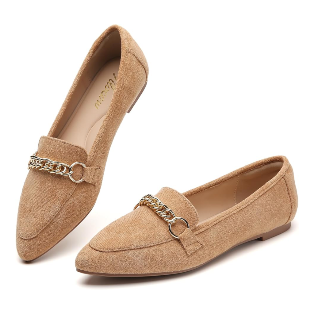 Tilocow women's pointed toe slip-on loafers in black leather featuring a polished finish and a decorative gold metal chain across the vamp on a white background.