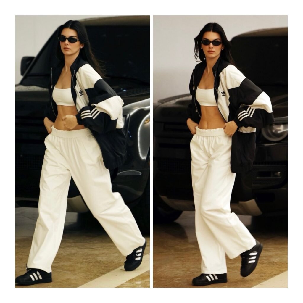 Kendall Jenner model-off-duty street style in a sporty chic black and white athleisure outfit for 2026 fashion inspiration.