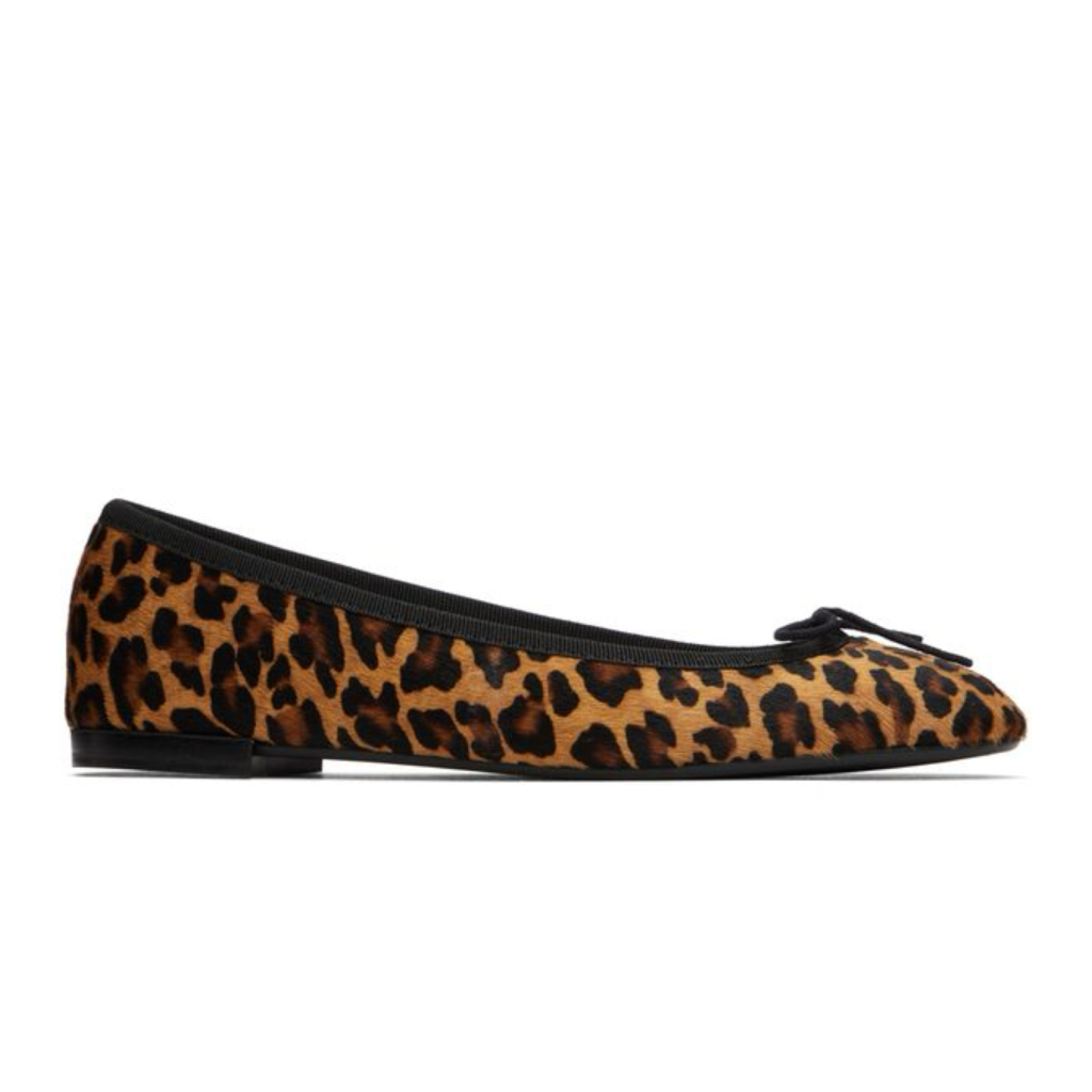 A pair of elegant leopard print pointed-toe ballet flats, featured on The Posh EdiT as a chic alternative to heels for a spring capsule wardrobe.