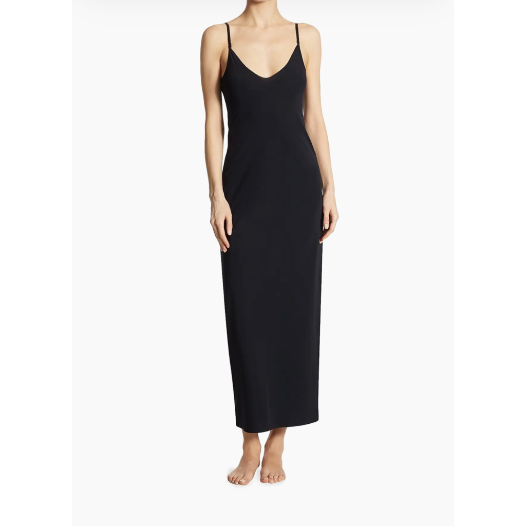 The Saks Fifth Avenue Classic Maxi Slip Dress in black, featuring a floor-length silhouette, delicate spaghetti straps, and a minimalist 90s design.